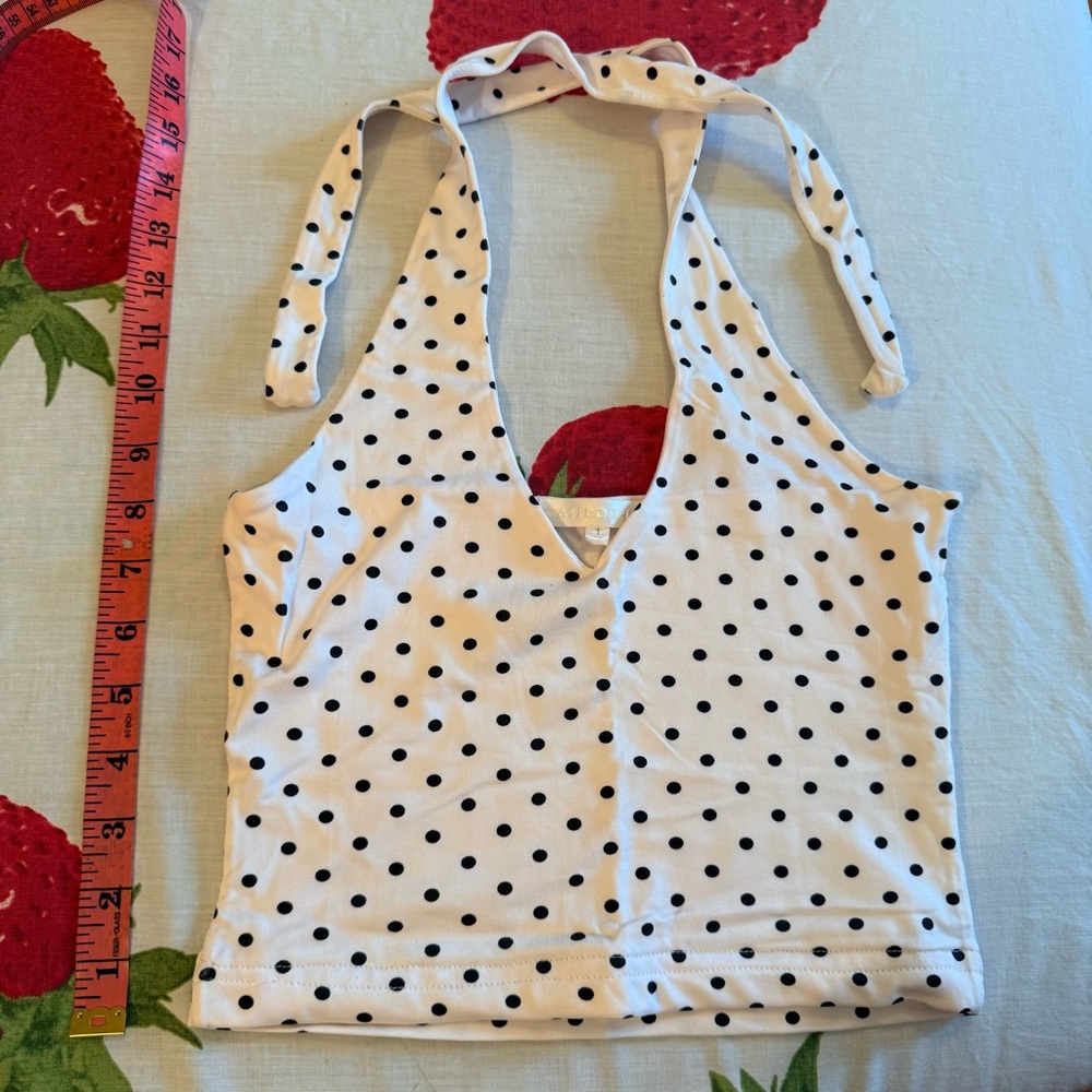 White top with black polka dots